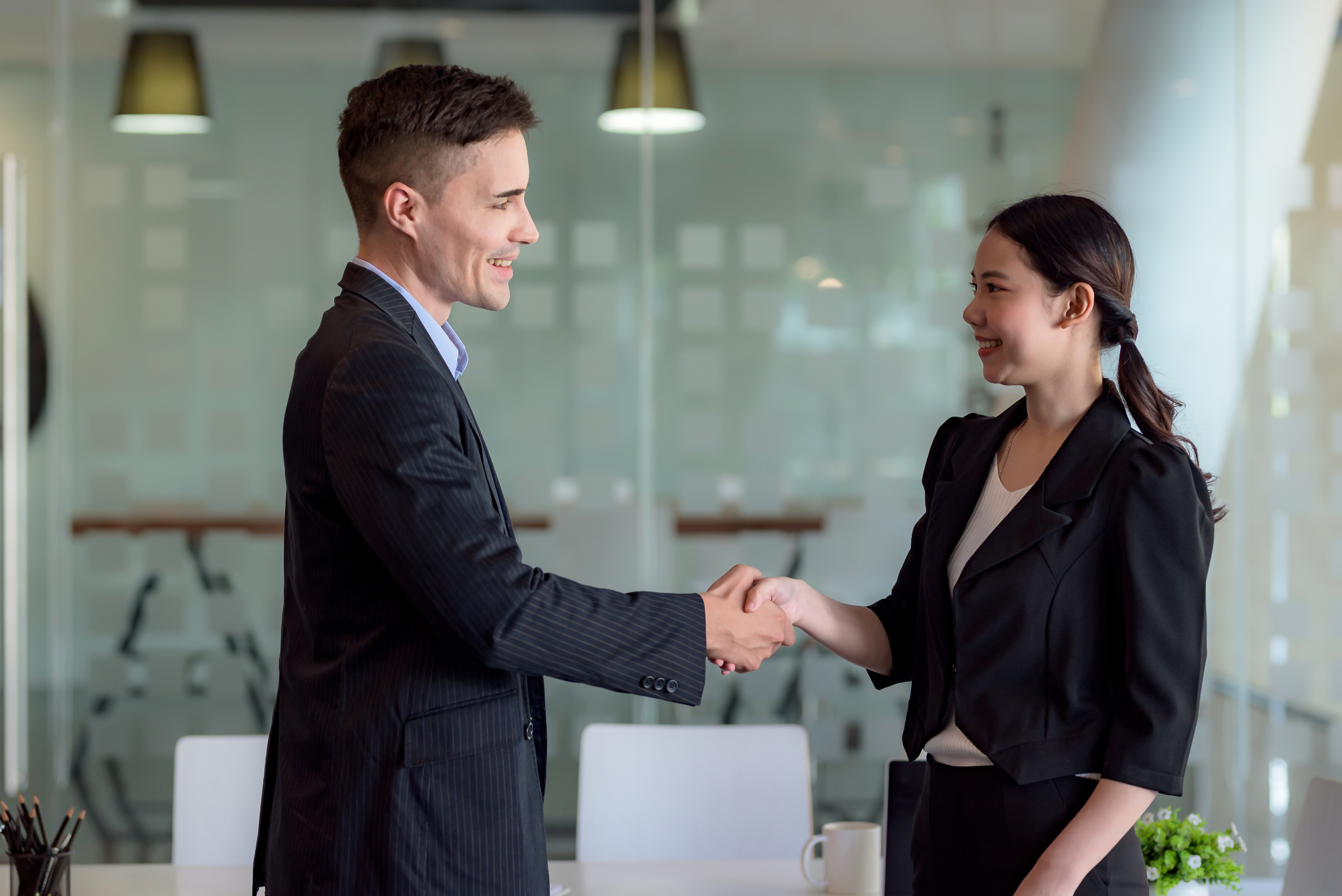 a man and woman shaking hands